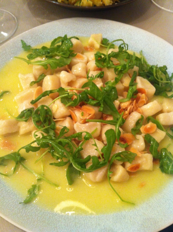 gnocci with toasted almonds and rocket