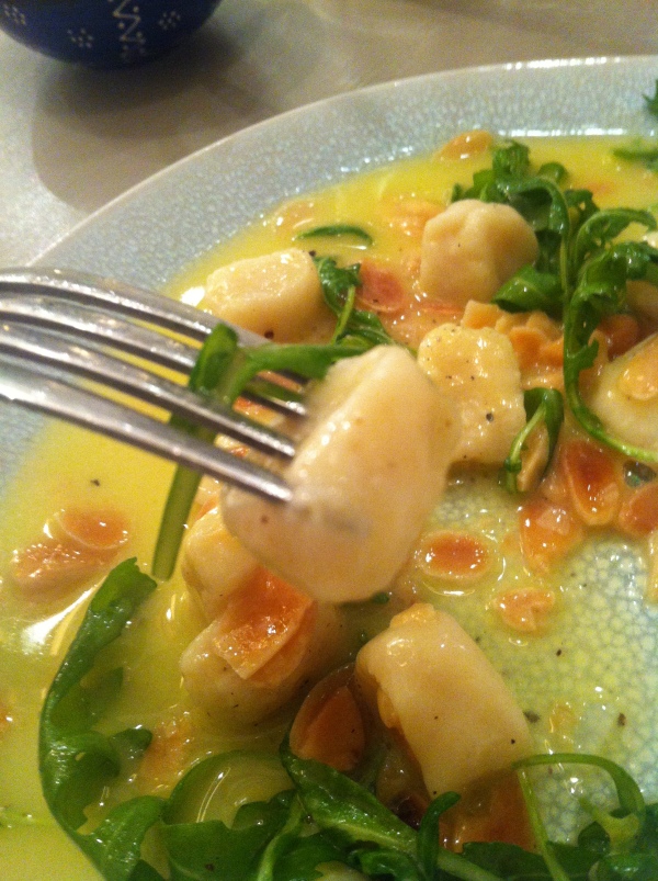 gnocci with toasted almonds and rocket